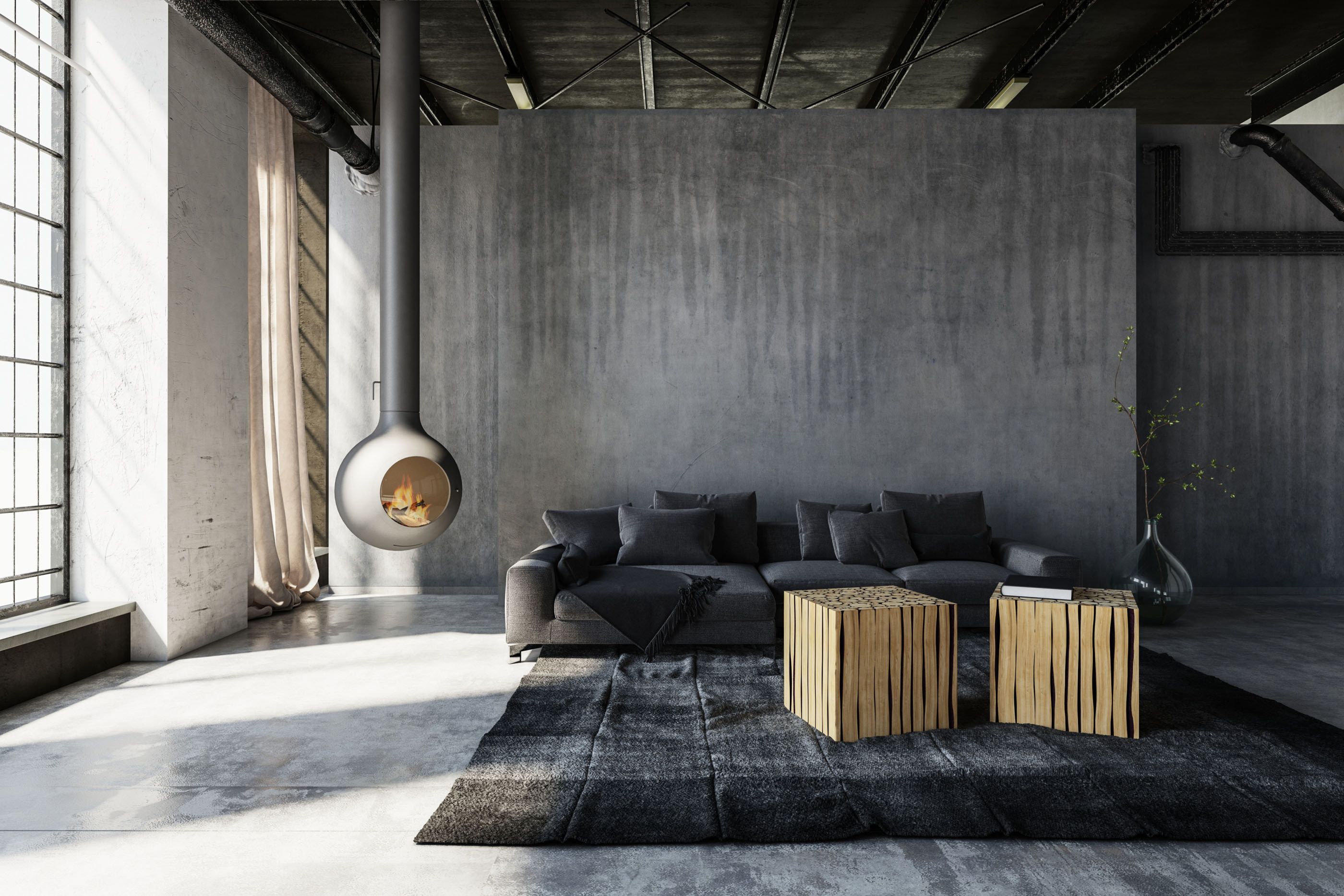 Wohnzimmer mit Sichtbeton hinter einer Couch